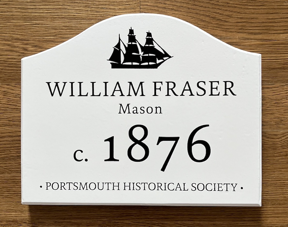 Wooden Plaque with ship and resident information.