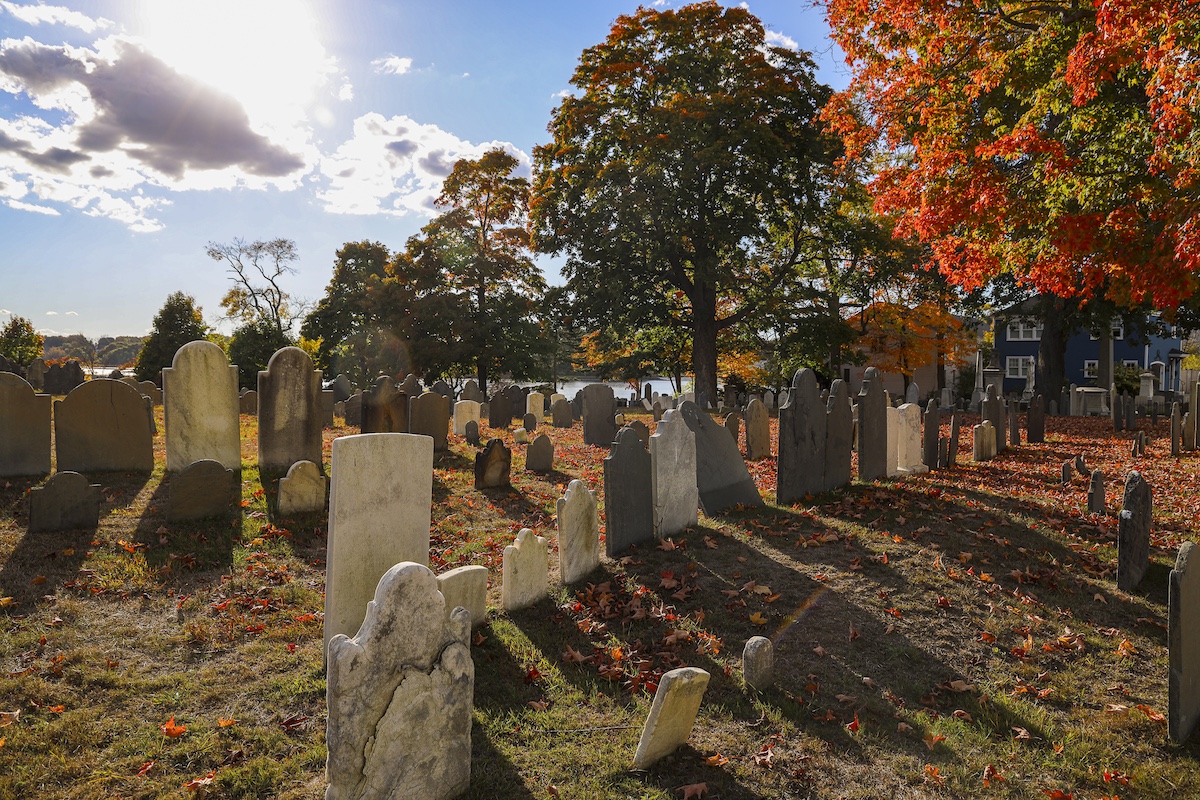 Tombstones on a sunny fall day.