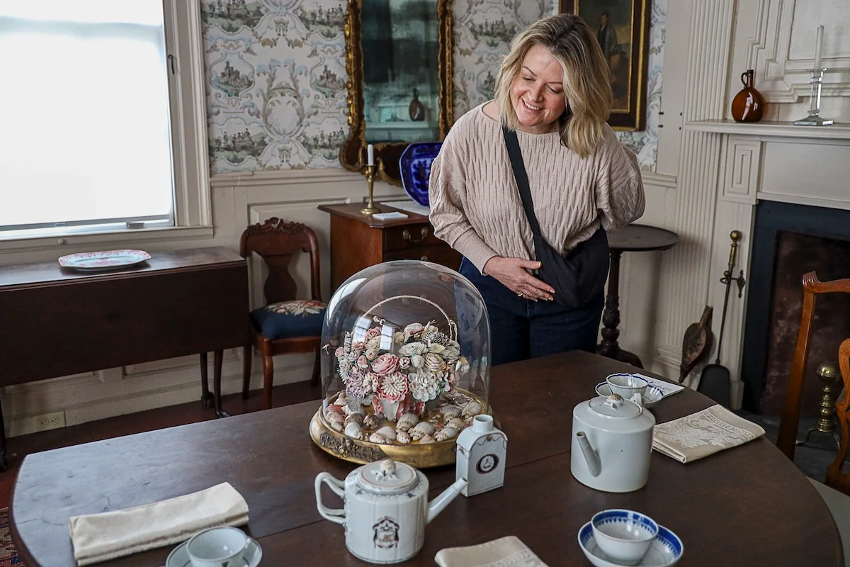 Women looking at a floral dome